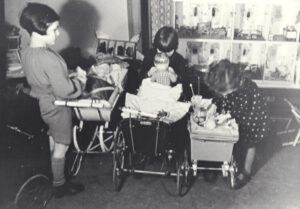 Description: Children with presents at Hanukkah Creator/Photographer: Unknown Medium: Photograph, black and white Date: undated Persistent U