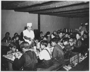 Scope and content: Full caption reads as follows: Taos County, New Mexico. The hot lunch, school at Penasco. Children pay about 1 cent daily