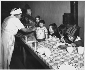 Scope and content: Full caption reads as follows: Taos County, New Mexico. The hot lunch, school at Penasco. Children pay about 1 cent daily