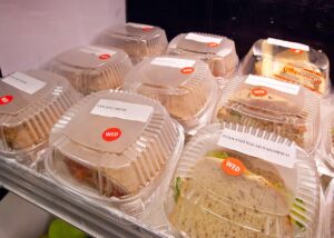 Healthy meal choices of ham and cheese wraps and tuna fish sandwiches at Washington-Lee High School in Arlington, Virginia for lunch service